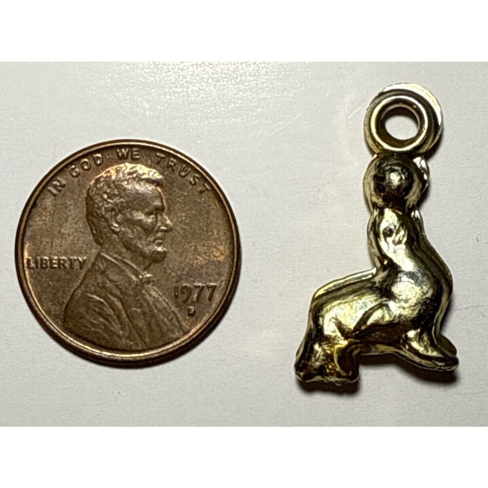 Vintage Gold Tone Metallic Seal Cracker Jack Charm 1C